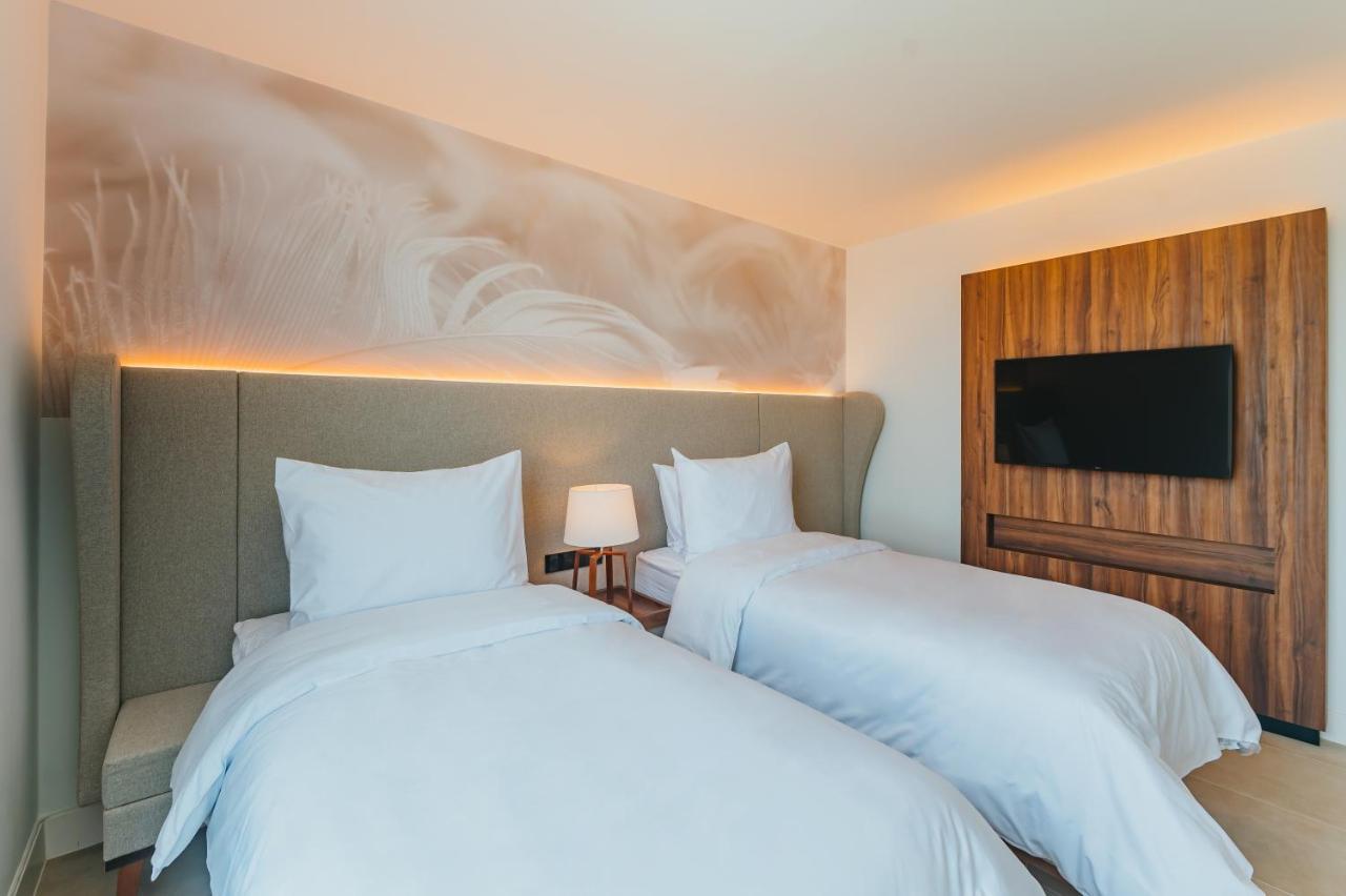 فندق Radisson Blu Aruba شاطئ بالم المظهر الخارجي الصورة